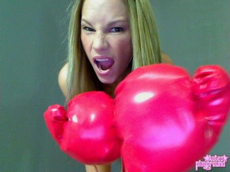 Nude Woman Wearing Boxing Gloves