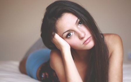 Sad Lonely Girl Bed Blue Shorts