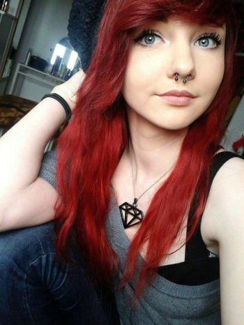 Scene Girl With Red Hair And Piercings