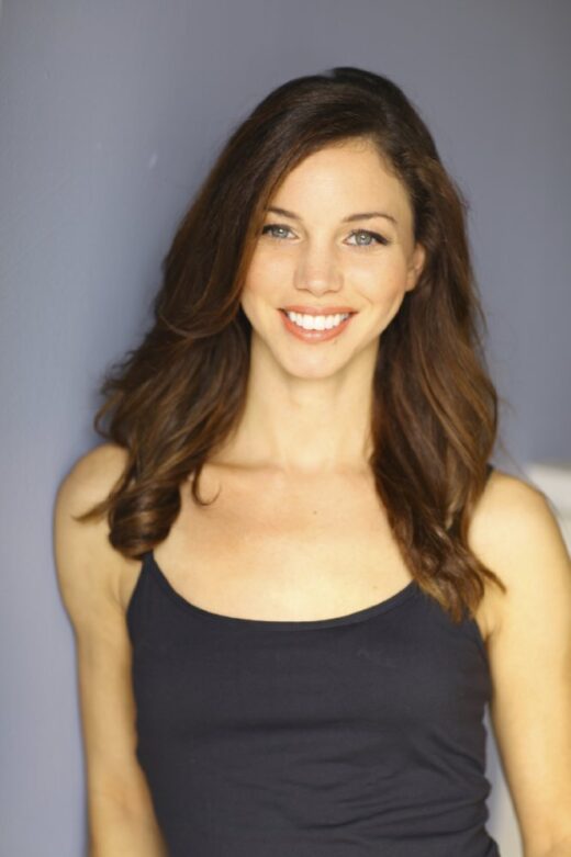 Stephanie Honore hot brunette woman smiling while posing